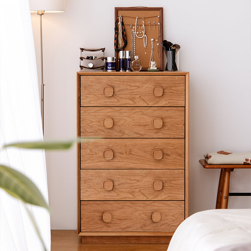 Retro-style solid wood storage cabinet against the wall in the bedroom